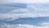 飞机上实拍云端之上的美