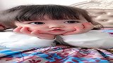 这宝宝好可爱，大眼睛圆圆的好漂亮，真想有个这样的女儿！