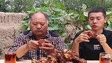 花块买斤大棒骨，红烧着吃，和大伯大口开啃，骨髓吃爽了