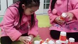 姐妹俩用纸杯玩，居然玩的这么嗨呢