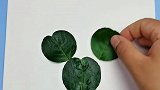 用树叶做仙人掌手工拼贴画，超级简单哦！