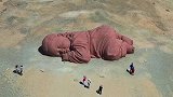 沙漠里沉睡的巨婴，大地之子