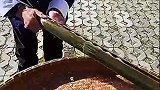 用竹竿搓米团，劳动人民的智慧