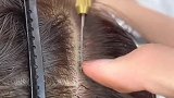 理发师的手艺真不错，感觉跟真的头发没区别