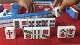 这个年轻人可是四川麻将的绝顶高手，一出手就能看出来