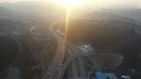 航拍夕阳下的济南扳到井立交桥，蜿蜒曲折纵横交错，壮观