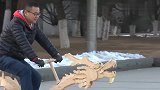 辽宁小伙骑“龙”？他用22000根雪糕棍，历时10月打造出街神器！