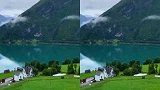 瑞士阿尔卑斯山脚下的小镇，云雾萦绕山峦，草地新绿一片生机勃勃