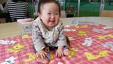 唐氏综合症宝宝：12个月大去体检，笑起来的样子特别可爱