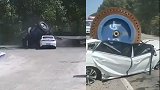 大货车25.6吨重物体坠落砸中小车 轿车被压扁司机当场死亡