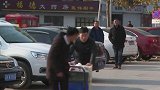 11.8万元零钞什么感觉？600斤！