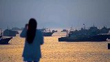 “白云偷喝了放在屋顶的酒，红了脸颊，变成了晚霞”