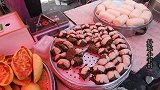 丹东集市发现一种满族食品，用树叶包粘米蒸着吃，你认识它吗