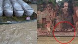 直击洪水过境四川乐山：1949年以来江水首次淹至乐山大佛脚趾