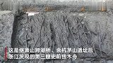 浙江余姚发现公元前2900年的独木舟 凹弧形细节清晰可见
