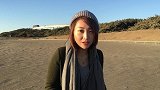 美女记者带你去看海 触景生情为国足最后一战祈愿