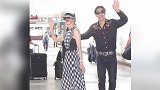 林志玲夫妇婚礼后现身高铁站 手捧婚礼花束牵手超恩爱