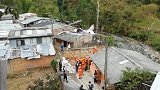 哥伦比亚一客机坠毁致7死 部分残骸落在民房顶部
