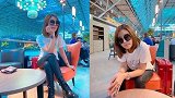 林心如走机场，戴报童帽穿小香风灵动俏皮