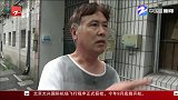 树枝划破车罩不给赔 女业主报警说老公被物业打了