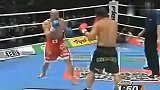 格斗-15年-格斗场残暴50次高腿踢 原地飞腿直接爆头-新闻