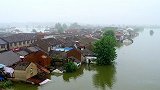 痛心！航拍安徽千年古镇暴雨过后：江心洲被淹，白墙灰瓦孤立水中
