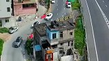 佛山最牛的房子，至今没人敢动，公路只能绕着走！