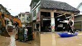 湖南江永普降暴雨：街道变水道 有居民开挖掘机、划船上街