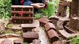 男孩子用泥巴捏出村庄，这是玩泥巴的最高境界