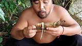 荒野胖叔：野外石板烤鱼，油滋滋火爆爆的，感觉味道还不错