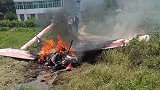 一架飞机降落湖南一块水田后起火 两名飞行员受伤