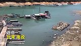 台湾日月潭缺水干涸 潭底变“垃圾场”杂草丛生