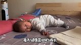 小宝宝趴在床上练习抬头,看这姿势就像要飞翔一样,好萌啊！