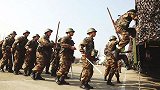 中国开启一级战备模式 2天召回15万军人