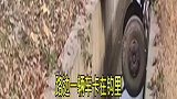 路边一辆车卡在钩里，车头与车身分离