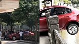 女司机倒车时错将油门当刹车 车尾悬半空险些冲下河