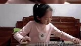 八岁女孩弹古筝演奏战台风这真是少年强则国强