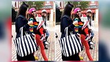 张柏芝太任性红皮草黄鞋，配绿包如此喜庆带俩儿子，外出抢尽风头