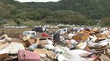 震撼！日本灾民台风后排队分类扔垃圾，有人连续往返20次扔完