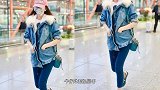 林志玲认真保暖的样子真可爱，牛仔外套加层毛，时尚感也加了不少