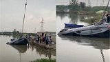 江苏一辆法拉利沉入河内 动用大型吊车打捞现场人山人海