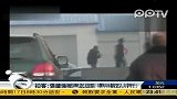 实拍张建强戴手铐被四人押送法院受审