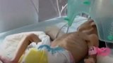 印度富商埋葬早产亡女 竟从1米深墓穴中挖出一个在哭女婴