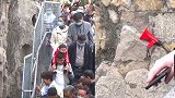 千年佛像被摸出包浆后 景区紧急加装铁网、放大喇叭劝导文明旅游