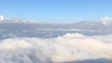 牛背山云海,远处是蜀山之王贡嘎主峰