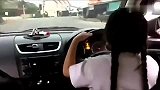 竞速-14年-实拍泰国9岁女童自己开车上学 “驾龄”2年-新闻