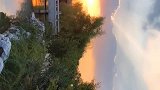 夕照中的蠡岛烟雨楼