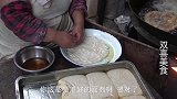 回族下油老店一天用六袋面，一个饼一斤重，顾客一拉一车带走