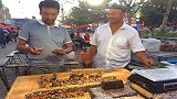 切糕5元一两明码标价出售，却还无人问津，游客表示就怕被下套