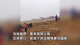 网传湖南一地土地整改挖沟机挖出铜钱，当地居民挖出上百斤？文保部门回应